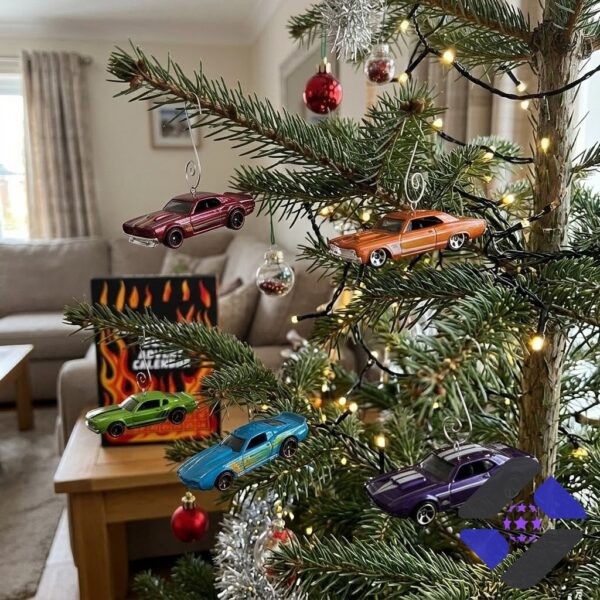 Hot Wheels Muscle Car 2026 Advent Calendar - arrangement of various toy cars on mantel