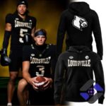 Louisville Cardinals For The Ville Uniform 2026 Hoodie - full view with football players in uniform