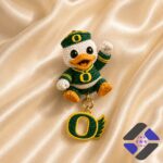 Oregon Ducks Mascot Dangle Earrings - full view on a satin background