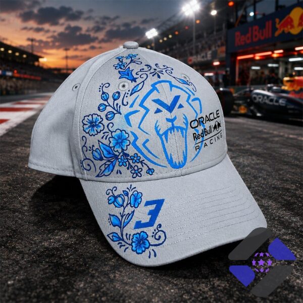 Red Bull Racing Cap with blue lion and floral design on race track