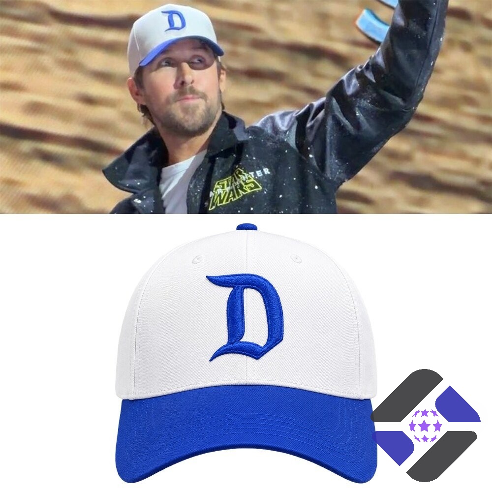 Ryan Gosling wearing a white and blue 'D' logo cap, with the cap also displayed as a standalone product